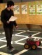 How to Walk A Robot: A Dog-Leash Human-Robot Interface